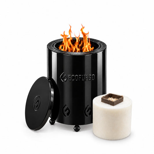 El Niño table top fire pit in gloss black, lit, with its lid and a 1kg wax refill