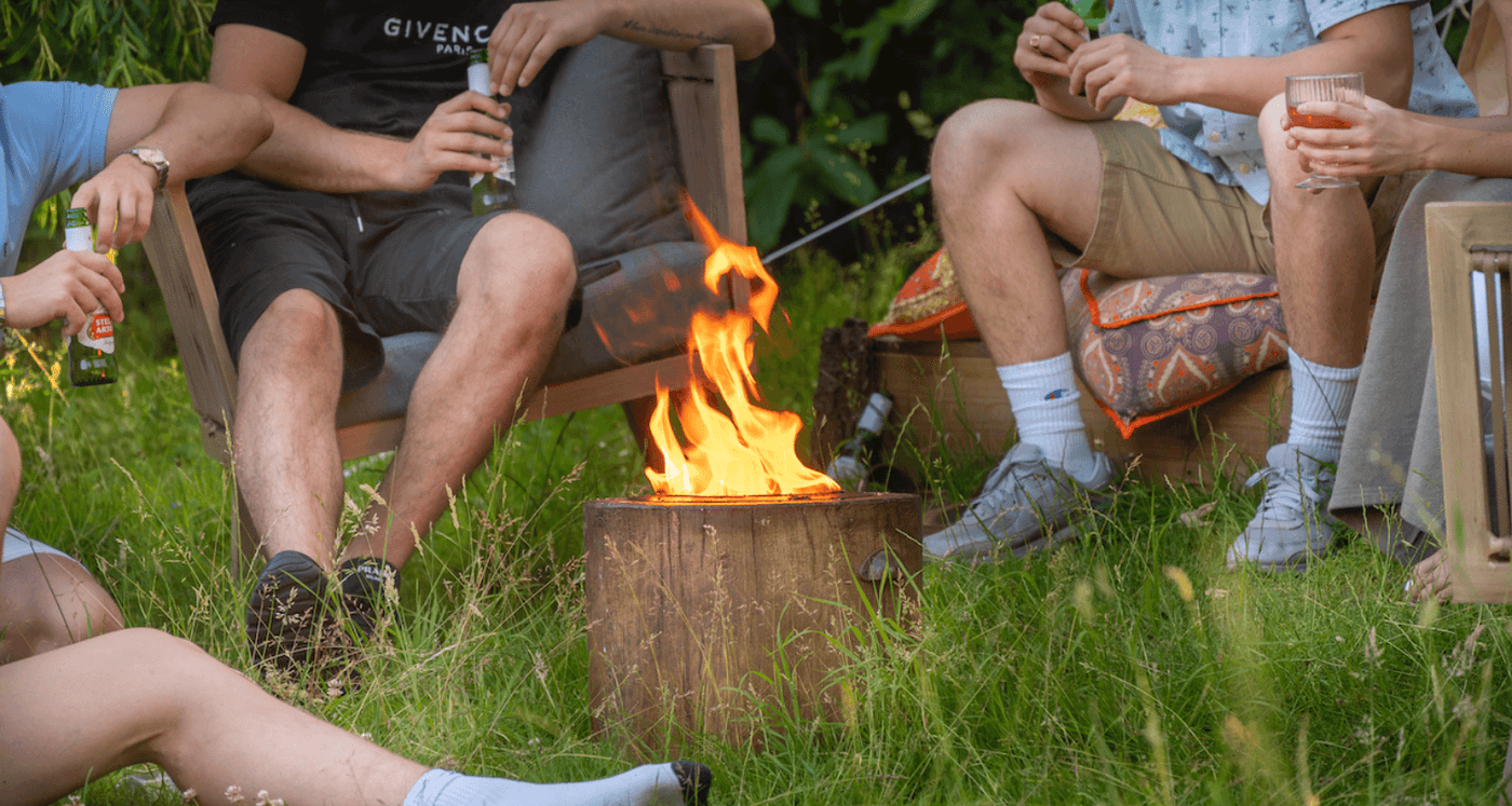 El Fuego fire pits | sustainable fire pit | image depicting people around a Fire camping and glamping outdoor living 
