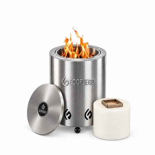 El Niño table top fire pit in stainless steel, lit, with its lid and a 1kg wax refill